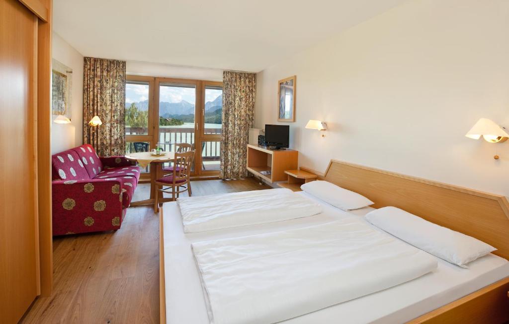 Apartment mit 1 Schlafzimmer und Blick auf die Straße - Westseite