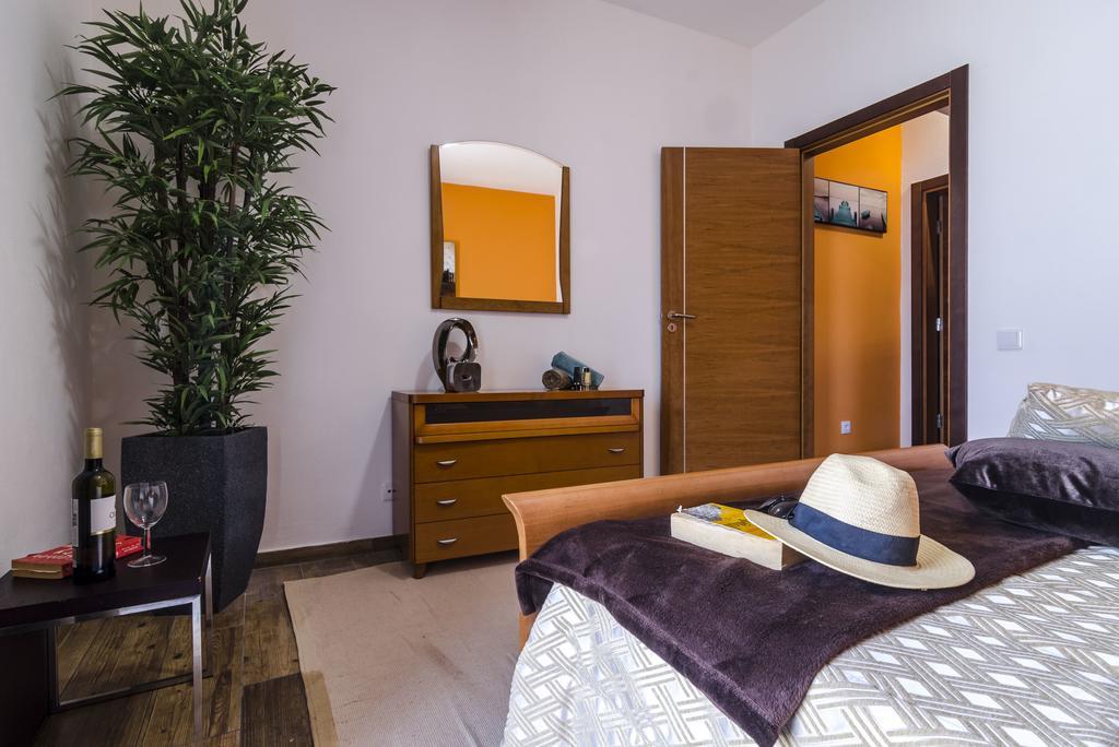 Quarto Triplo com Casa de Banho Partilhada