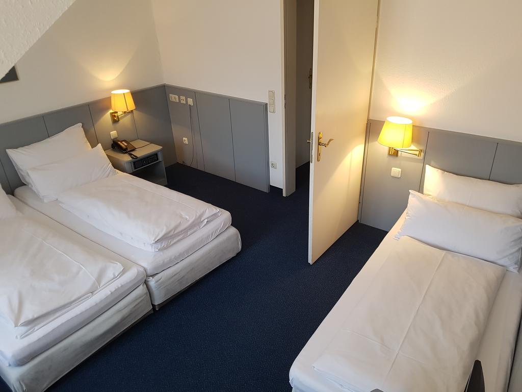 Dreibettzimmer