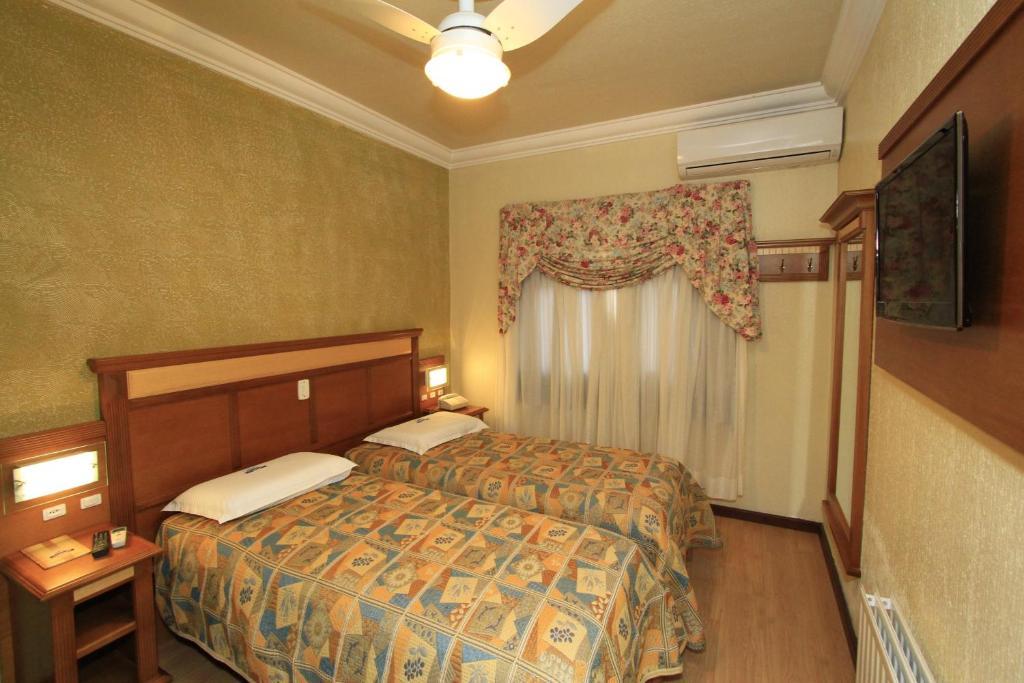 Quarto Luxo com Cama de Casal ou 2 de Solteiro