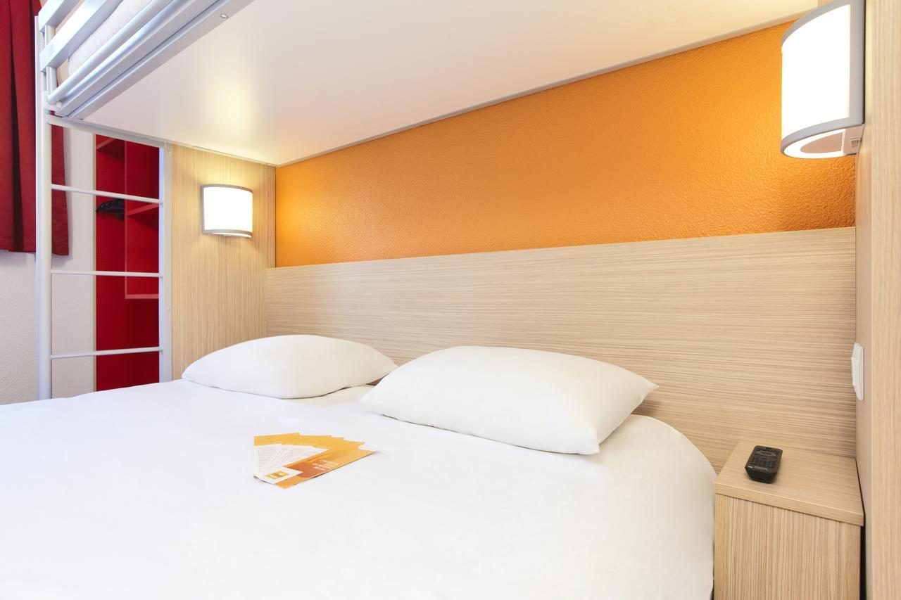 Chambre Triple (2 Adultes & 1 Enfant)