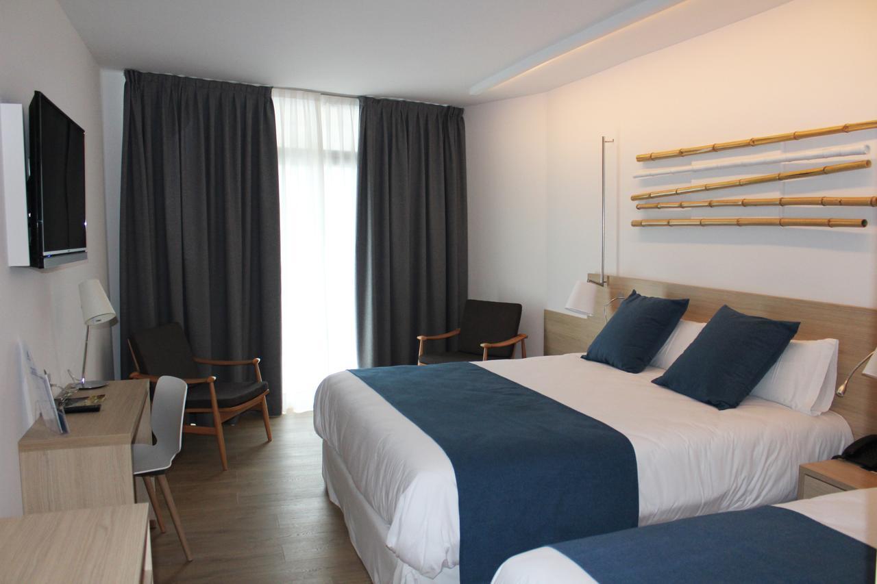 Chambre Quadruple Design (4 Adultes)
