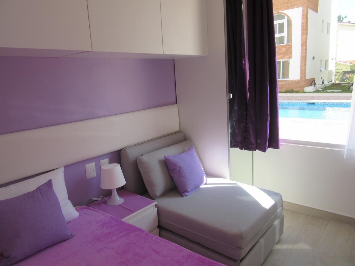 Suite Deluxe Presidencial con patio y acceso y vistas a la piscina (planta baja)