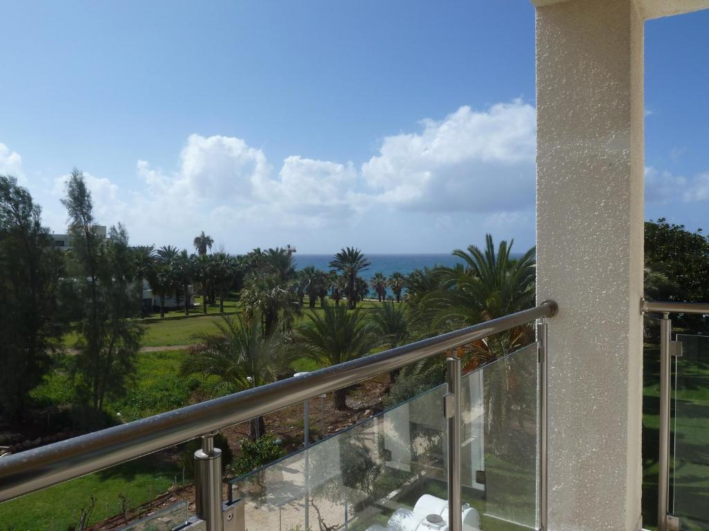 Superior One-Bedroom Suite with Side Sea View