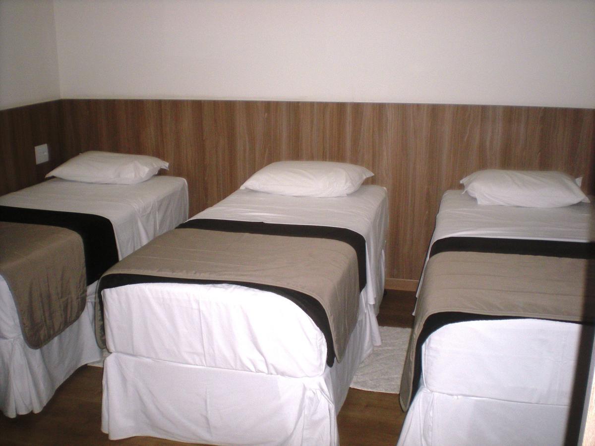 Quarto Triplo com Vista da Cidade