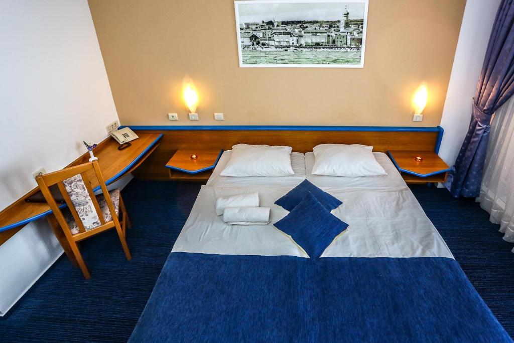 Doppelzimmer mit Balkon und Meerblick