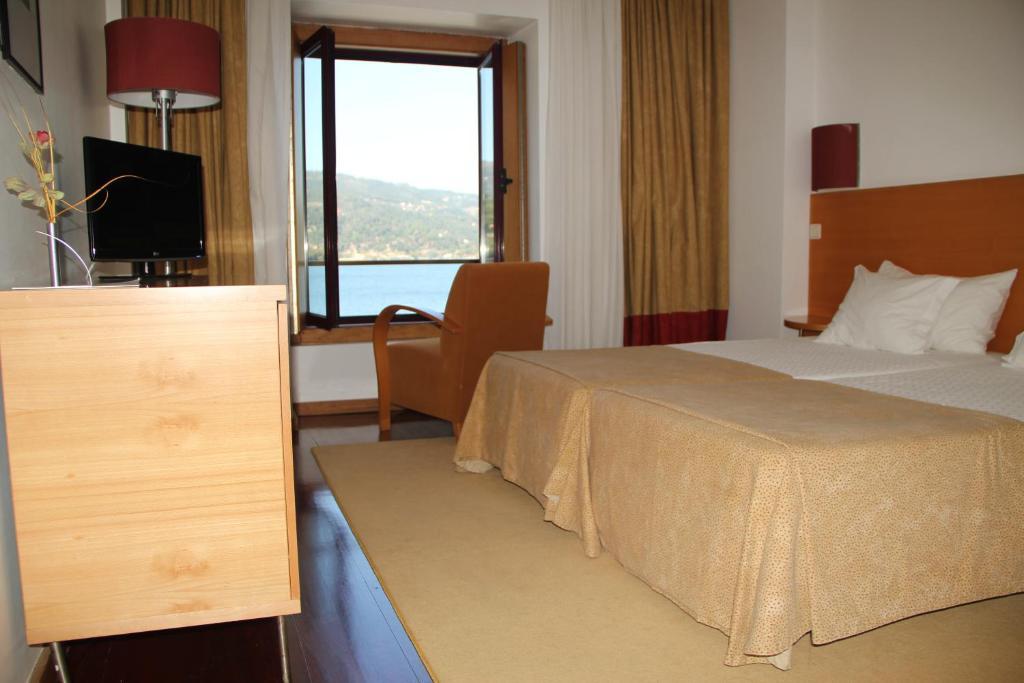 Quarto Twin com Cama Extra