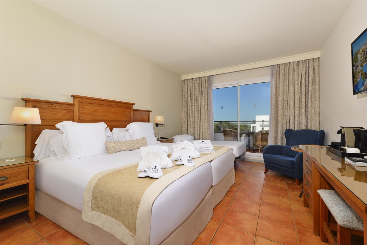 Habitación Doble Exclusive con vistas laterales al mar