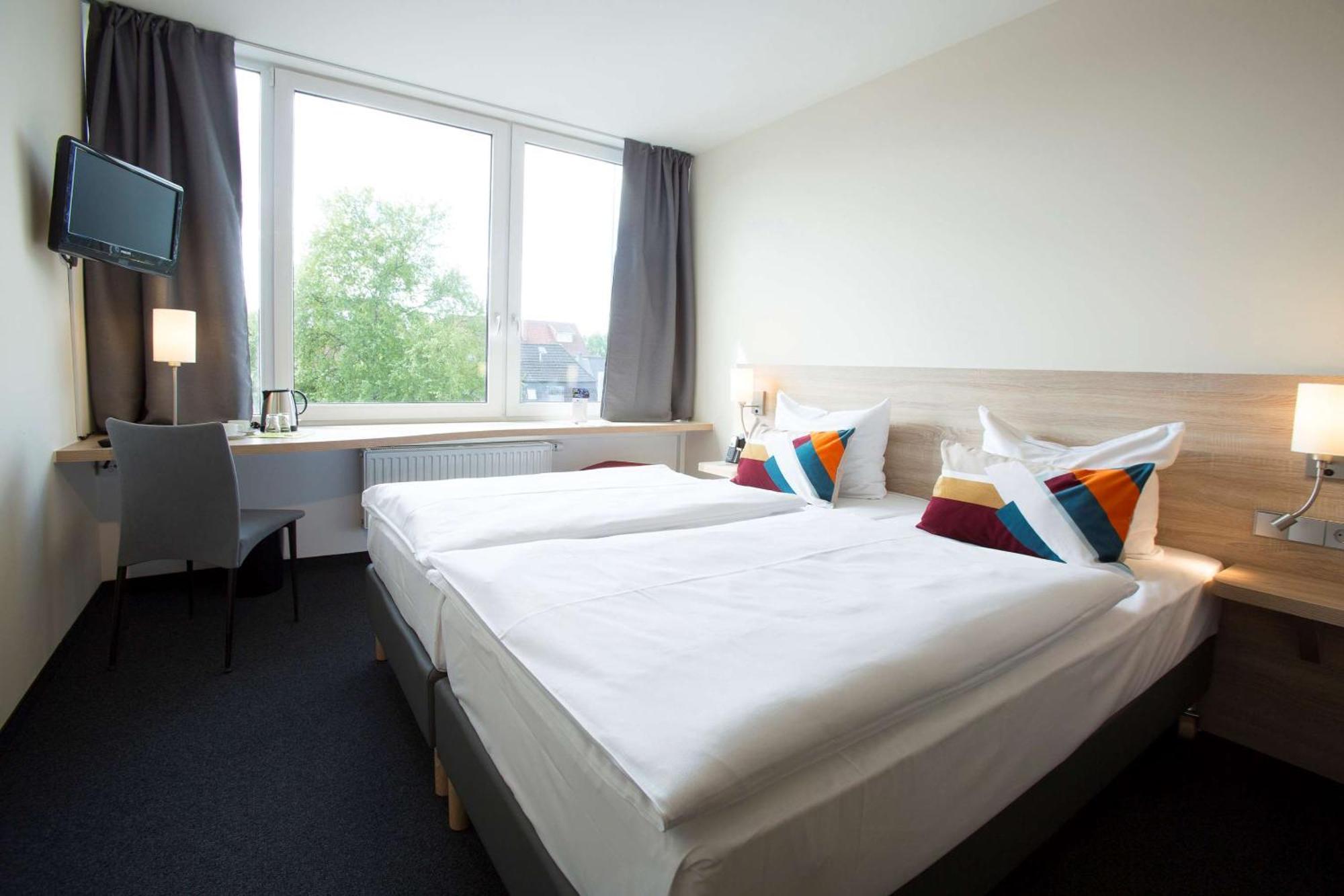 Doppel- oder Zweibettzimmer mit Blick auf den Innenhof