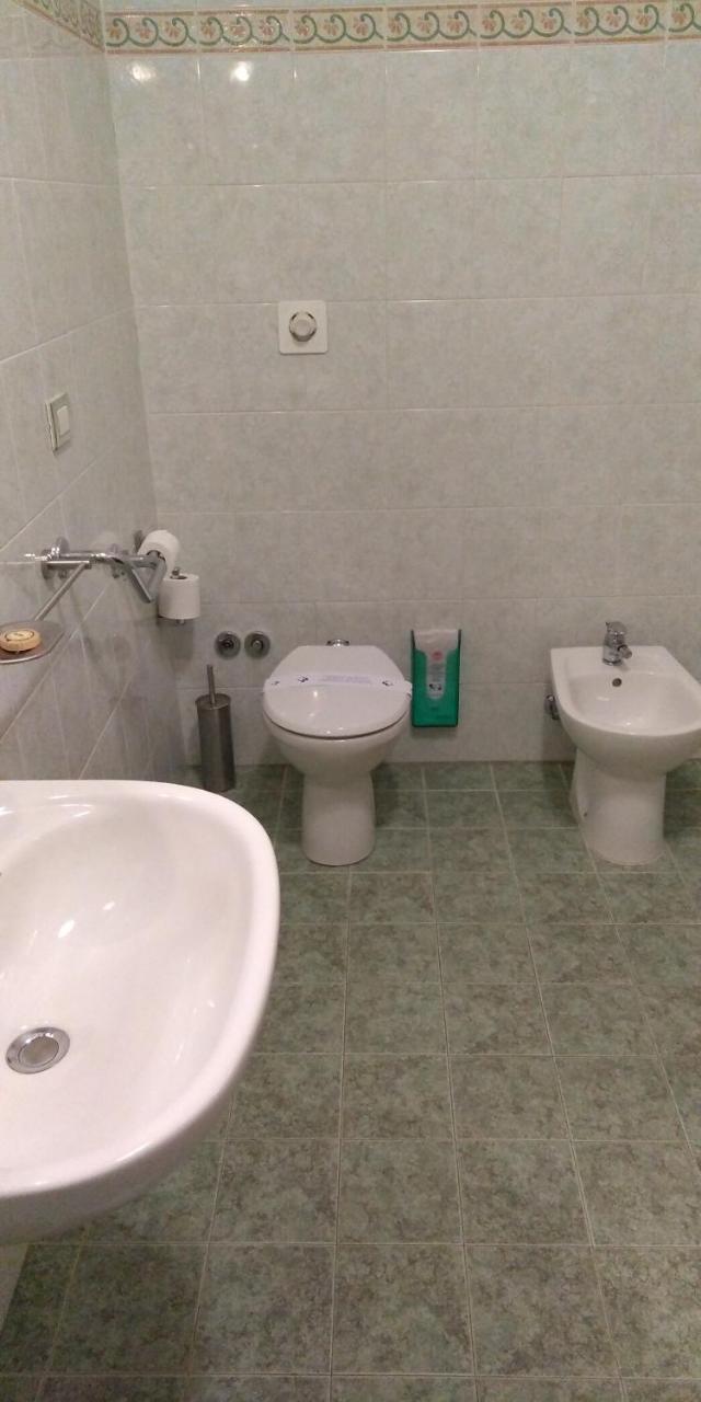 Small Double Room with Private External Bathroom (bathroom 7 meters distance from room door)