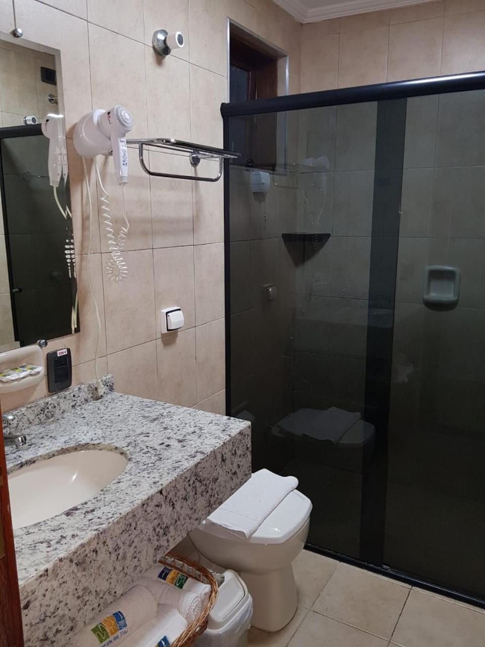 Quarto Quádruplo com Vista do Mar.