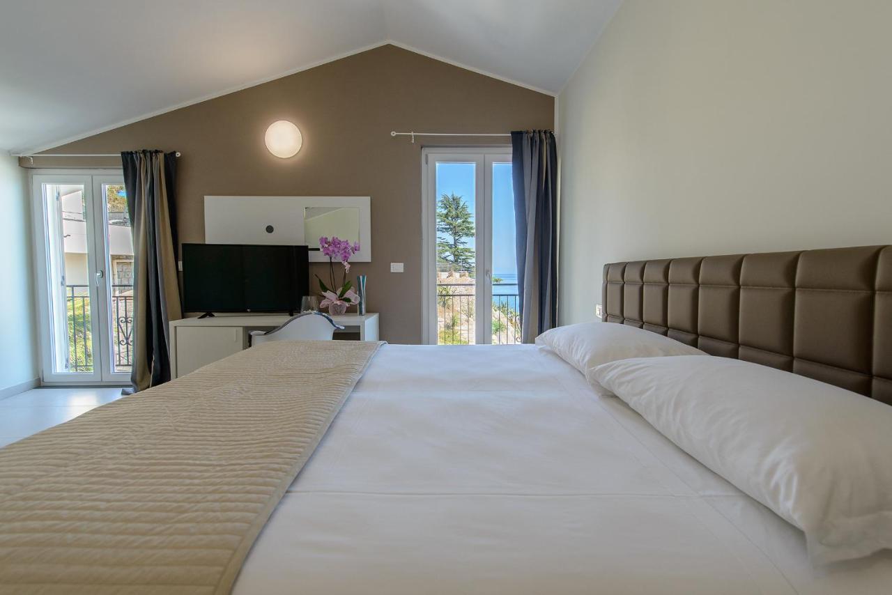 Quadruple Room with Balcony and Sea View,569559594:JPEG