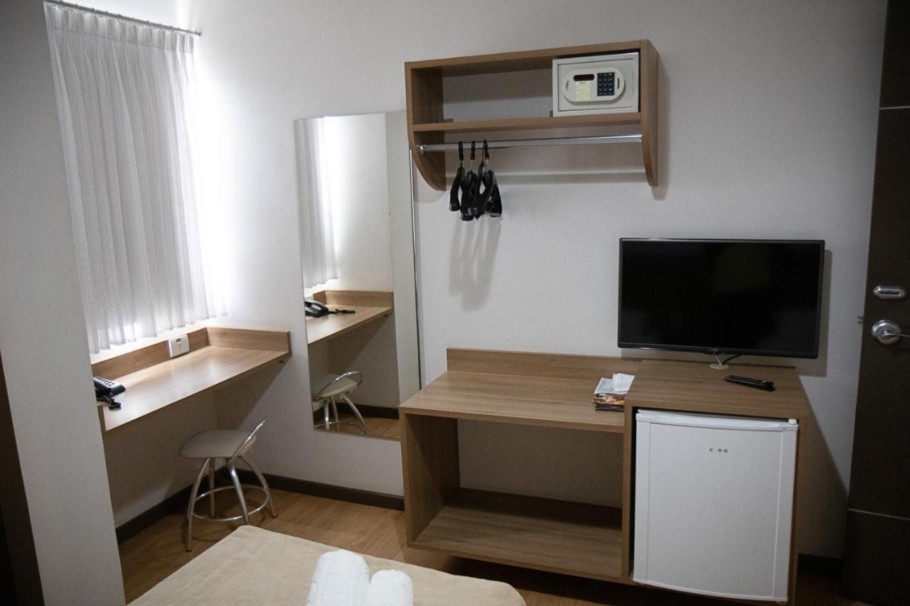 Quarto Triplo Executivo
