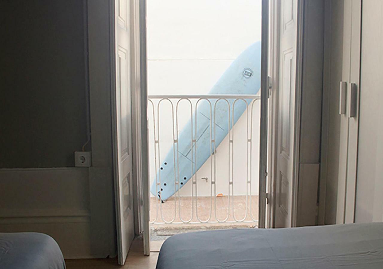Quarto Triplo Económico com Casa de Banho Partilhada