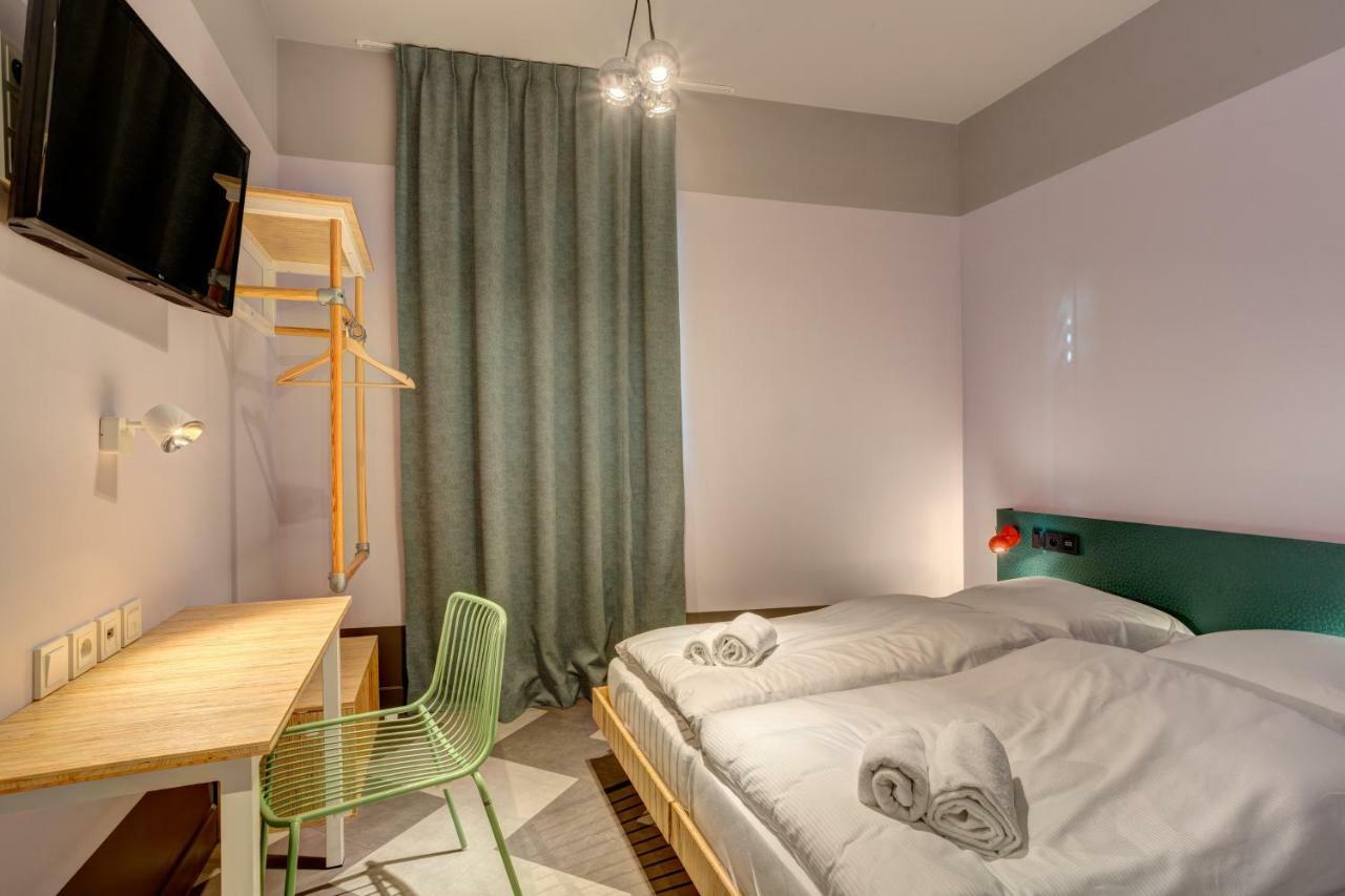 Tweepersoonskamer met 2 Aparte Bedden