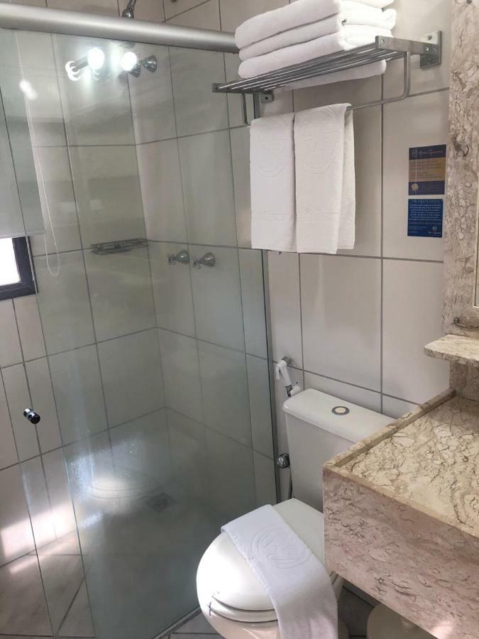Quarto Triplo Deluxe com Varanda