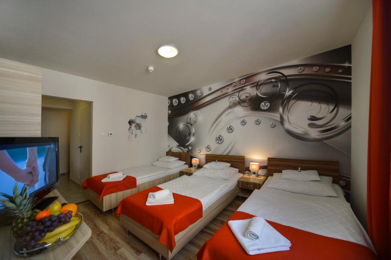 Quarto Triplo (3 Camas Separadas)