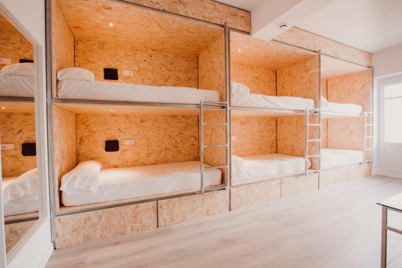 Habitación 6 camas con baño privado