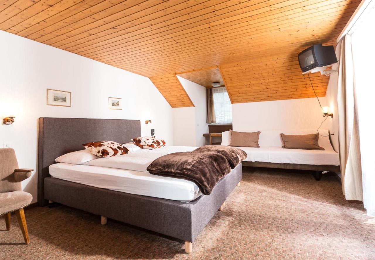 Dreibettzimmer mit Balkon