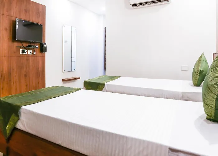 Treebo Comforts Inn, University Road Deralakatte