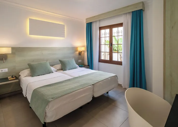 Suite Hotel Montana Club